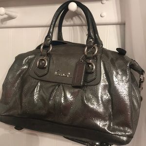 Gray metallic coach purse